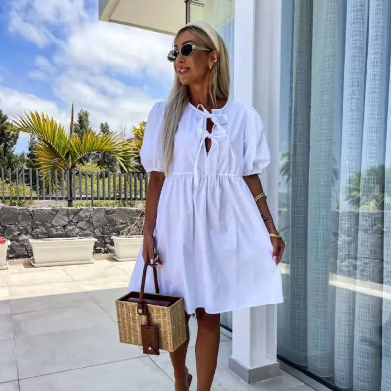 What should I wear tomorrow?Womens Trendy Solid Color Bow Tie Front Puff Sleeve Dress